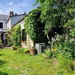 Maison centre-ville avec dépendance et jardin.