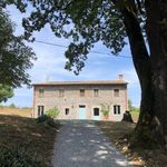 AZ291 - Agricultural company comprising 15 hectares of land with a stone farmhouse, stables, and outbuildings