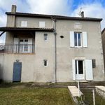 Maison en pierre avec terrain et garage dans village