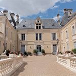 Two bedroom apartment in stunning chateau with swimming pool and land.