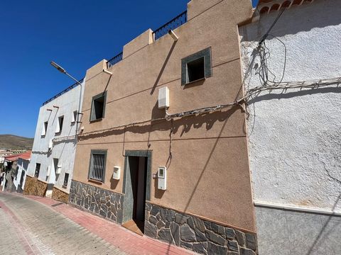A beautifully presented 2 bedroom townhouse located in the heart of the Spanish countryside village of Uleila del Campo.    Throughout the entire property you will find many traditional features such as wooden beams and brick walls.   With access fro...
