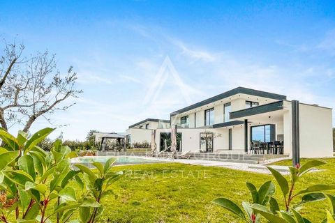 ALPHA LUXE GROUP is selling an attractive villa surrounded by nature with a panoramic sea view, Kaštelir, ISTRIA It is located in a quiet place 7 kilometers from the first beaches and 14 km from the main square in Poreč. It has a total living area of...