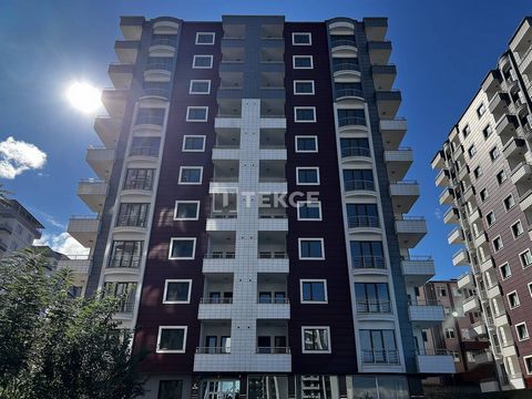 Appartements Dans une Résidence Avec Sécurité à Yomra Sancak Les appartements sont situés dans le quartier de Sancak à Trabzon, Yomra. Son emplacement central permet de rejoindre facilement le district de Yomra. Le quartier de Sancak offre un accès f...