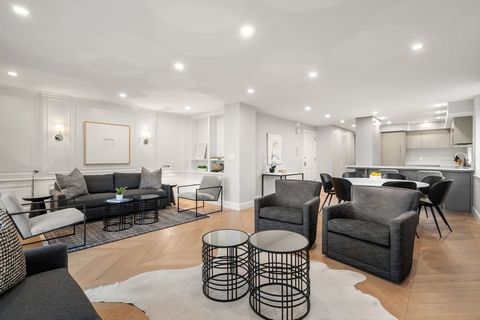 A magnificent renovation of a 2 bed / 2 bath Waterside Beacon residence in a premier full-service elevator building. This corner unit has magical Back Bay views and is uniquely positioned to enjoy stunning views of the Charles River, Lagoon, Esplanad...