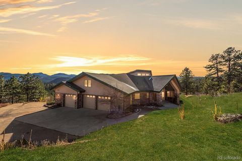 Welcome to your dream escape! Nestled on Flagstaff Rd just 8 miles from Boulder's iconic Chautauqua, this mountain retreat is a visual feast with panoramic views from every corner. Set on 35 acres, this 4-bed, 4-bath haven blends rustic charm with mo...