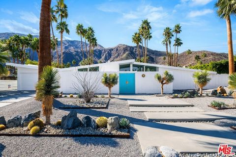 Introducing Maison Bleue Moderne, a stunning 1950's gem in the highly sought-after Vista Las Palmas neighborhood. Designed by William Krisel and built by the Alexander Construction Company, this mid-century modern masterpiece was Modernism Week's Fea...