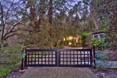 Estate home situated in a quiet & serene park like setting tucked away from the street. This gated property is located in the heart of Portola Valley, a short stroll to Town center, Famers market, Summer concerts, Just a few minutes drive to 280 & Sa...