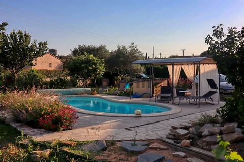 Southern Cévennes, between Saint-Ambroix and Barjac, close to the Cèze Valley and its activities Single-storey T4 detached villa, with terrace, garage, land and swimming pool The property has a living room/kitchen of about 50m2, opening onto a terrac...