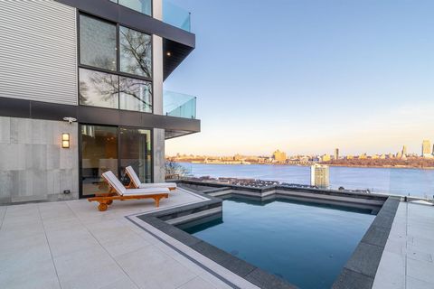Nestled atop the serene enclave of Cliffside Park, New Jersey, 6 Columbia Avenue is a breathtaking, brand-new, California-inspired single-family home, offering unparalleled luxury and stunning views stretching from the George Washington Bridge to the...