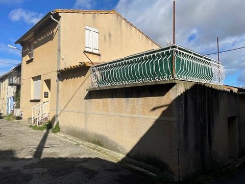 In a village with all amenities between Narbonne and Carcassonne Village house with terrace and 2 cellars Ground floor: Kitchen, living room, shower room + toilet 1st: 1 bedroom, 1 office Electricity redone and still under decadal, double glazing, In...