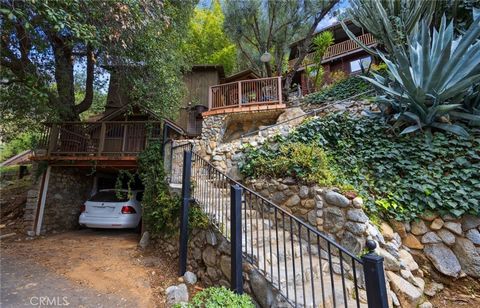 Welcome to 804 Woodland Dr/Wormwood Cottage located in the picturesque and serene setting of the Sierra Madre Canyon. This home offers to separate homes and both are very unique and charming. As you enter the stairs lead you to the power half of the ...