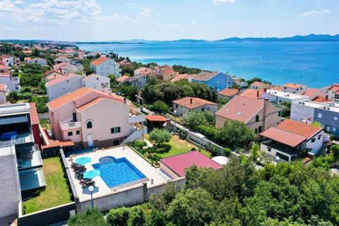 A beautiful apart-house of 5 luxury apartments is located only 150 m from the crystal clear sea and the beach in Kožino, an elite settlement in the city of Zadar. It is only a 10-minute drive from the city center, and offers complete peace and freedo...