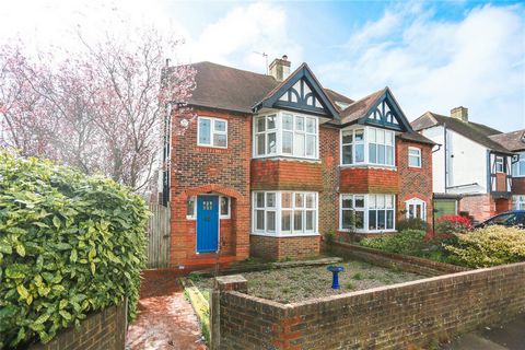 The large living space and separate dining room feature art deco style wooden fire surrounds and wooden flooring. The dining room French doors open to the South facing garden. Upstairs on the first floor there are three well proportioned bedrooms, th...