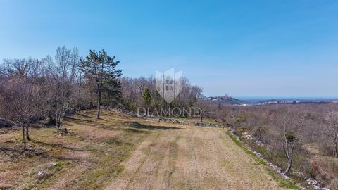 Location: Istarska županija, Buje, Buje. Istria, Buje We offer a building plot on the edge of the construction zone with an incredible view of Bujština region! The land has 1765m2, is of regular shape, flat surface and all the necessary infrastructur...