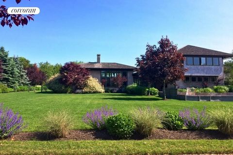 Immerse yourself in the pinnacle of luxury living with this extraordinary custom home nestled in Southampton Village. Crafted by its discerning owners, this majestic residence spans over an acre of lush grounds, backing onto a sprawling reserve of fa...
