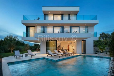 www.biliskov.com  ID: 14183 Sukošan-first row to the sea Detached luxury villa of 495m2, built in 2023, a few meters from the sea. The villa is located in an attractive location in Sukošan, a few minutes away from Zadar. The interior and courtyard of...