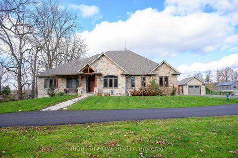 Executive Luxury in a Tranquil Oasis. Exceptionally designed & crafted, this custom-built bungalow was constructed with the highest of standards. Situated on a picturesque 1.78 acres, perfectly located between Cambridge, Guelph & Hamilton for easy ac...