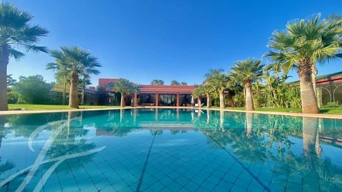 This property is enviably located in an exclusive gated community with golf course less than 15 minutes from downtown Marrakech. The villa is nestled in a beautiful manicured 2 hectare park hosting a 29 meter swimming-pool and a tennis court. Boastin...