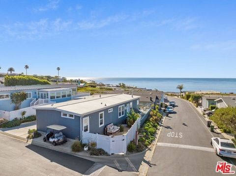 World-class whitewater and sunset views, stunning interiors, and ultra-low space rent! This spectacular custom-designed 3br/2ba home offers an incredible opportunity to enjoy direct ocean views in one of Malibu's most highly-coveted private communiti...