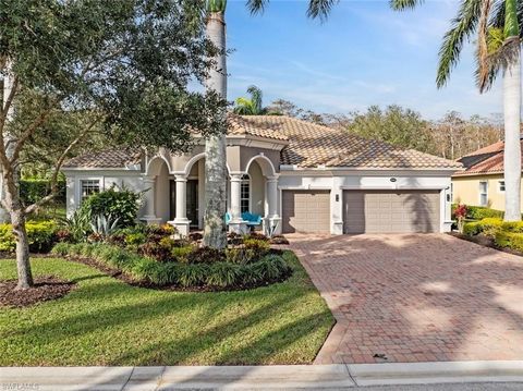 GOLF MEMBERSHIP is included with this gorgeous HERITAGE BAY Golf and Country Club home located on a PRIVATE PRESERVE VIEW and is ready to move in NOW. All you need are your clothes with this TURNKEY home. This house features the popular DORAL floor p...