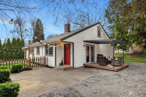 This 3+ BD mid-century Lovell home is on a peaceful 1/4/ acre park-like sanctuary offering unmatched convenience. Located minutes from DT Seattle, Sea-Tac, Alki Beach, & the heart of West Seattle & White Center, it’s a commuter’s dream & a gardener o...