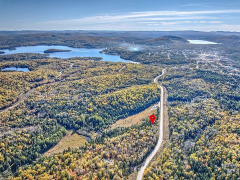 Large lot of almost 185,000 sq. ft. surrounded by nature bordered by a pond on Chemin Manawan in St Michel des Saints. Building rights. Snowmobiles, ATVs, public access to Dominica Bay on Lake Taureau less than 5 minutes away, and several great activ...