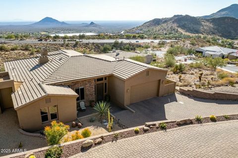 STUNNING VIEWS await you in the highly sought after gated community of THE SUMMIT AT CRESTVIEW in Fountain Hills. Enjoy breathtaking Southern panoramic Sonoran Desert vistas from the comforts of home, set high on the hill. Watch the magical display o...