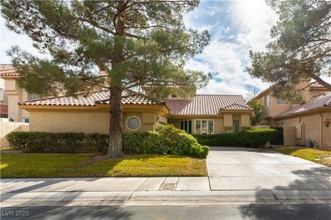 This beautiful 1-story golf front home is located in the prestigious Spanish Trail Country Club community! This open, bright, and airy floor plan has 20+ foot ceilings at the entry, plantation shutters, cased windows, and huge picture windows w/views...