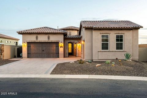 This gorgeous home in the private, gated enclave of Sienna Hills is ideally located in the Shea corridor. Stunning views of the McDowell Mountain range paint the picture as you enter the community. Newly built in 2020, the home is in pristine conditi...