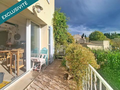 Maison plein centre très lumineuse avec grande baie vitrée sud donnant sur un balcon