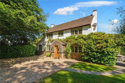 Welcome to Lawn Cottage, an exquisite 4-bedroom detached home brought to you by Fine & Country New Forest. Brimming with charm and character, this stunning property is nestled in the highly sought-after village of Burley, located within the scenic Ne...