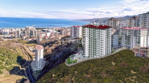 Impressive Sea View Family Concept Real Estate in Yomra Trabzon The real estate is situated in Kaşüstü, a central location close to many amenities such as a hospital, airport, university, cafe, and shopping mall in Yomra. The region offers quality st...