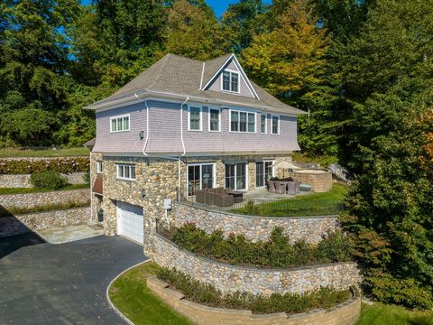 This impeccably maintained residence, crafted with stone and shingle, graces a spacious .28-acre parcel, offering over 4,300 square feet of opulent living. The highly sought-after and aesthetically pleasing floor plan boasts expansive living and dini...