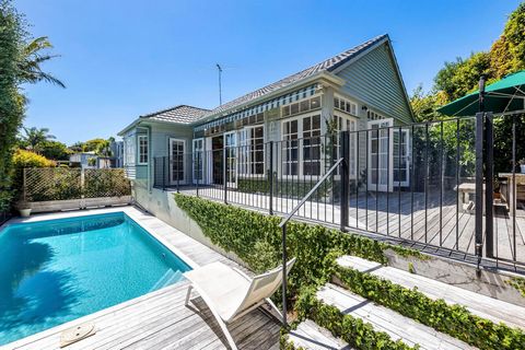 Positioned on an elevated site, this charming, weatherboard, 1930s home has been thoughtfully developed and modernised over time and now enjoys abundant sunlight through pretty timber joinery, enhanced by high stud ceilings. The spacious kitchen/livi...