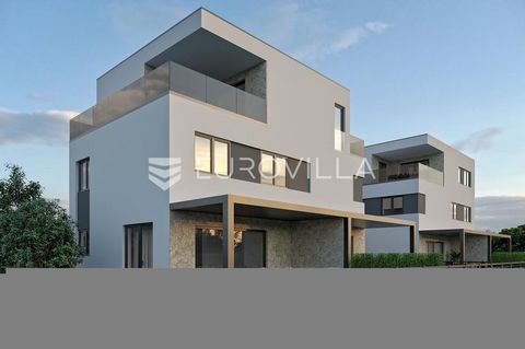 Pag, Mandre, two-story apartment in a new building, NKP, 95.60 m2. The apartment extends over two floors. The ground floor consists of an entrance area, an open concept kitchen, dining room and living room, bathroom and terrace, and on the second flo...