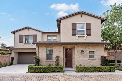 Beautiful move in ready home in the heart of Baker Ranch near Tennis park. Welcome home to this Shea built home that has a great floor plan with 3 bedrooms + den and 2.5 bathrooms. Main level has a large living room, White on White kitchen with stain...