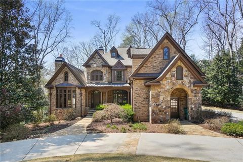 Step into the ultimate expression of luxury living in Sandy Springs! This gracious gated executive manor radiates refinement from every angle. Entertain guests in style in the formal dining room, complete with a butler's pantry. The formal living roo...
