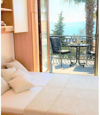 All information/price list at ... Panoramic position above the city center of Crikvenica. Balcony with a beautiful sea view. 10 minutes walk to the next beach. Air conditioning, free WiFi, satellite TV. Brightly and friendly furnished, ideal for roma...