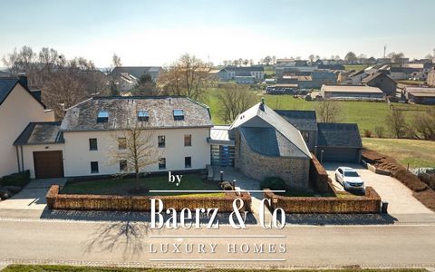 Immopartner invites you to discover this beautiful architect-designed, 700 m² two-family house, with 450 m² of living space, built on a fenced plot of 3400 m². This exceptional and unique property in Luxembourg is made up of spacious, bright and eleg...