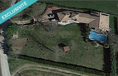 Maison avec piscine et grand garage sur 2400 m²
