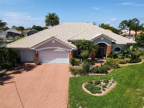 Welcome to your dream home in the desirable sailboat country of Palm Coast, Florida! This gorgeous 3-bedroom, 2-bathroom sanctuary boasts a plethora of amenities, making it an absolute gem in a serene cul-de-sac setting. As you step inside, prepare t...