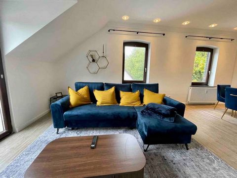 This stylish and centrally located accommodation spans over two floors and boasts upscale interior design. Recently renovated, the apartment provides access to an expanded attic space with a separate bathroom and an additional bedroom. On the first f...
