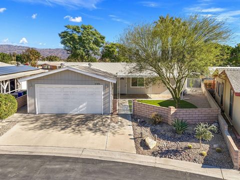 Amazing Opportunity! Don't miss this ADORABLE, 3 bedroom, 2 bath manufactured home in the desirable 55+ community of Coronado Gardens, on FEE land (you own the land). Fenced yard includes covered patio in front providing shade and a great entertainin...