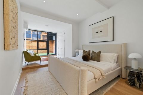 Introducing a truly one-of-a-kind garden duplex that effortlessly merges the exclusivity of townhouse living with the refined elegance of boutique condo design, nestled in the vibrant heart of Williamsburg with the lowest monthlies. This meticulously...