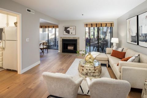 Experience the luxury of condominium living nestled within a serene and spacious community just minutes from downtown Mountain View. This light-filled home features beautiful new wood floors, vaulted ceilings, remodeled kitchen and bath, plush new be...