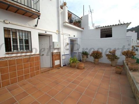 Situated in a quiet typical Andalucian street in the old part of Torrox village with parking facilities nearby. Via a little square decorated with flowers you access the house, The main floor comprises a living-dining room and an open kitchen. A spir...