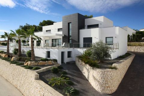 Modern villa for sale situated in Solpark with beautiful open views over the valley towards the sea and on short distance from the town of Moraira.  The villa consists of 3 floors. Ground floor: Entry hall, open plan lounge/dining/kitchen, laundry ro...