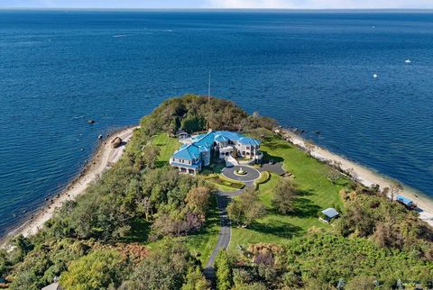 A gorgeous waterfront estate on Crane Neck Point, this home is one of a kind. Architecturally designed to take advantage of an extraordinary 10+/- acre lot with 300 degree views of the Long Island Sound, the home is perfectly built on a curve. There ...