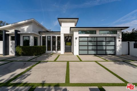 Tucked away in the highly sought-after Valley Village neighborhood, this reimagined modern farmhouse seamlessly blends luxury, comfort, and cutting-edge design. Completely rebuilt, this single-story home spans nearly 3,300 sq. ft., offering 4 spaciou...