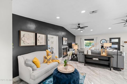 Vintage meets contemporary in this delightful home in the heart of north central Phoenix. Remodeled in 2019 to add new A/C, electrical panel, and all new kitchen, complete with stainless steel appliances and soft close modern cabinetry. Tons of addit...